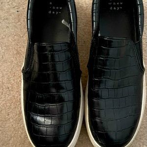 Used once, Black pleather platform sneakers.